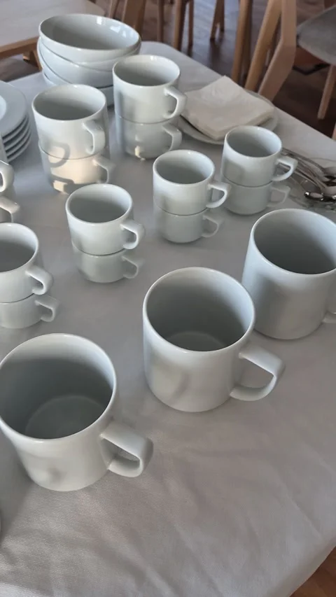 Clean breakfast buffet table with white tableware ready to use Stock Footage 340321958