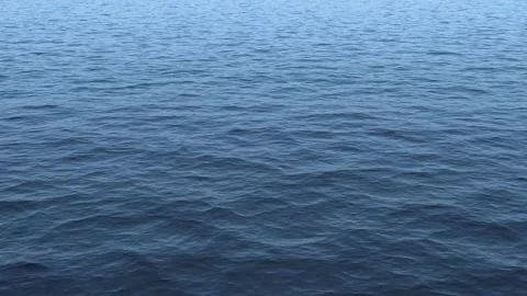 Clean calm blue ocean view of breezy day waves Stock Footage 255702810