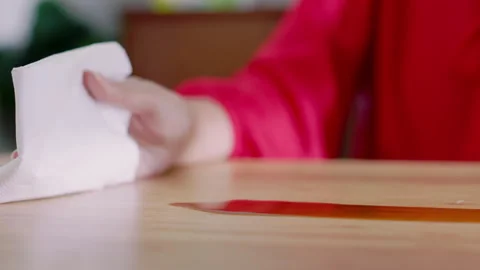 Clean coffee on the wooden table by Tissue Paper Close up slowmotion Stock Footage 242829670