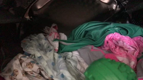 Clean colored laundry and washing ball in the washing machine. Stock Footage 132875451