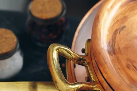 Clean copper cookware in kitchen close up Stock Photos