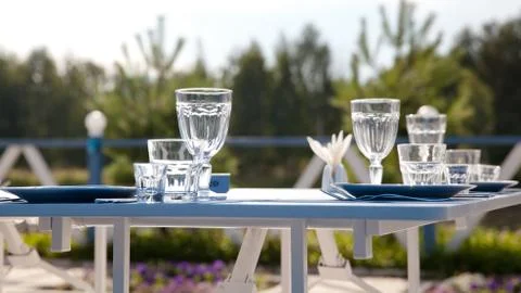 Clean Cutlery.table setting in summer cafe Stock Photos