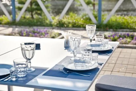 Clean Cutlery.table setting in summer cafe Stock Photos