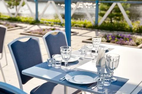 Clean Cutlery.table setting in summer cafe Stock Photos