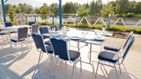 Clean Cutlery.table setting in summer cafe Stock Photos