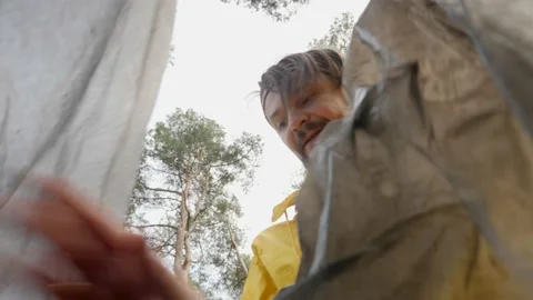 Clean up day environment and plastic trash pick up. Man cleaning forest a park Stock Footage 151931549