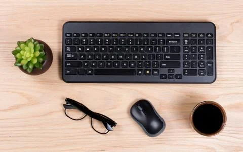 Clean desktop setup with modern wireless computer keyboard Foto stock