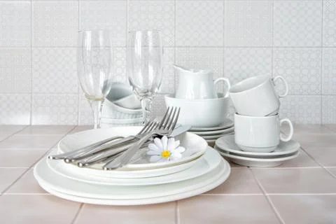 Clean dishes on the kitchen table Stock Photos