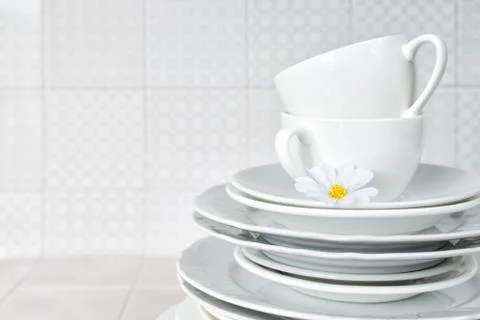 Clean dishes on the kitchen table Stock Photos