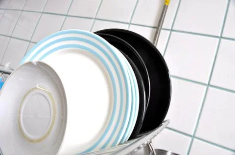 The clean dishes on the rack Stock Photos