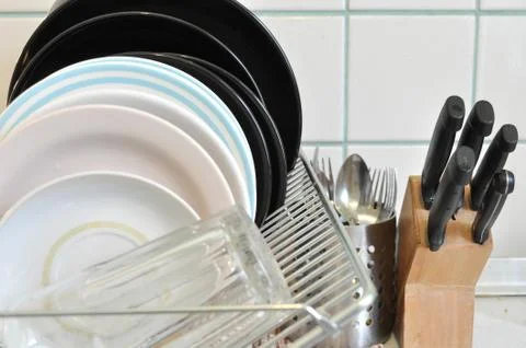 The clean dishes on the rack Stock Photos