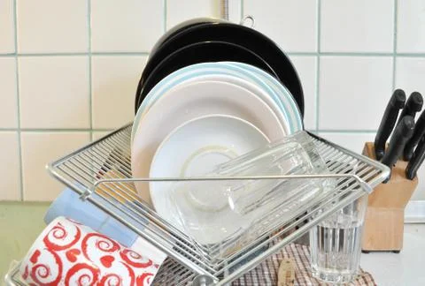 The clean dishes on the rack Stock Photos