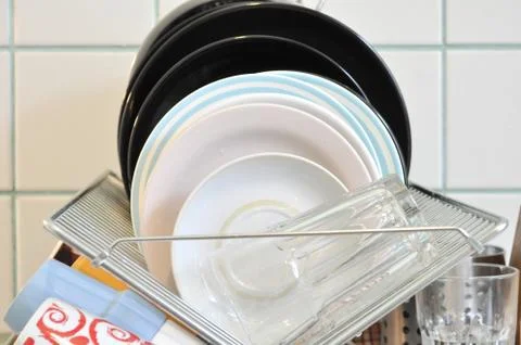 The clean dishes on the rack Stock Photos