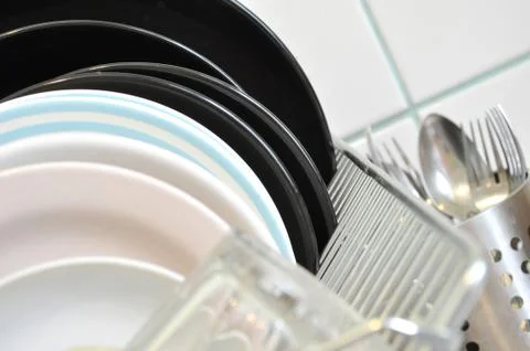 The clean dishes on the rack Stock Photos