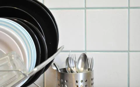 The clean dishes on the rack Stock Photos