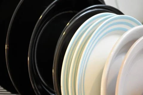 The clean dishes on the rack Stock Photos