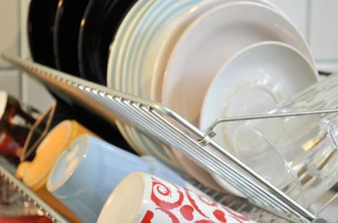 The clean dishes on the rack Stock Photos