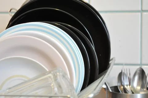 The clean dishes on the rack Stock Photos