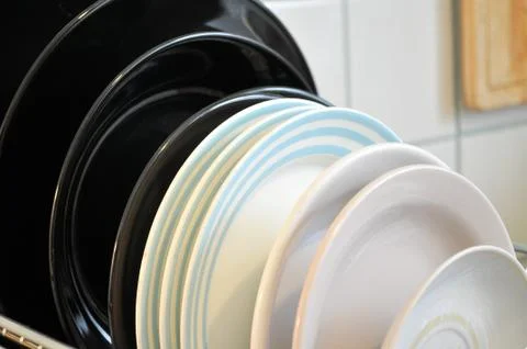 The clean dishes on the rack Stock Photos
