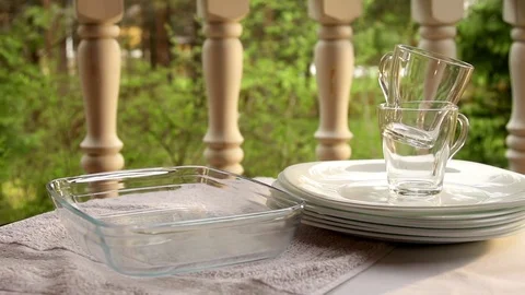 Clean dishes on a table in slow motion Stock Footage 82731724