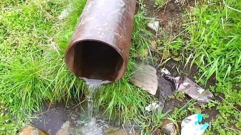 Clean drinking water from spring flows from pipe Stock Footage 113671399