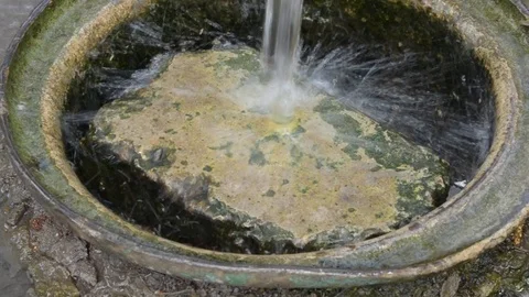 Clean drinking water stream poured stone Stock Footage 88939365
