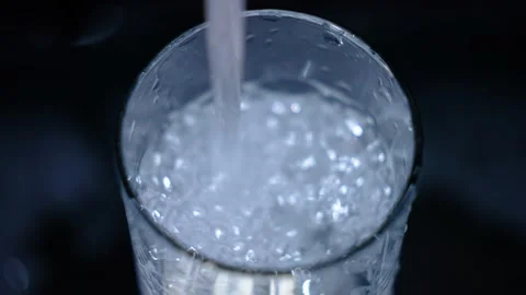 Clean drinking water from the tap. Slow motion. Stock Footage 235677536
