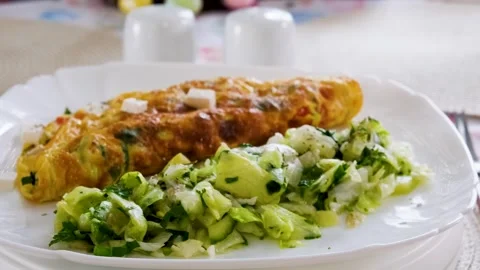 Clean Eating Breakfast with Egg Omelette and Green Salad Vídeos de archivo 332751159