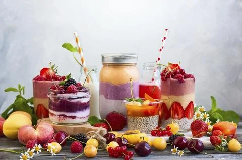 Clean eating ideas for breakfast or snack. Assortment of berry fruit smoothies, Stock Photos