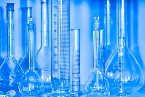 Clean empty flasks and test tubes close-up. Abstract background. Concept of Stockfoto's