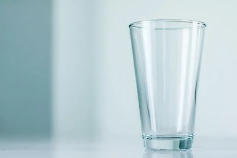 Clean empty glass on marble table Stock Photos