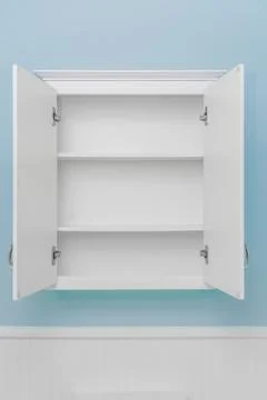 Clean empty white cabinet with both doors open Stock Photos