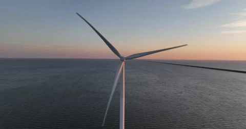 Clean energy, wind energy, wind farm, green energy, wind turbines at sunset 스톡 동영상 310659412