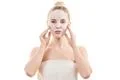 The clean face mask on the beautiful woman on the white background Photo