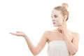 The clean face mask on the beautiful woman on the white background Photo