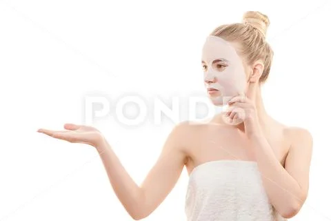 The clean face mask on the beautiful woman on the white background Stock Photos
