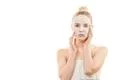 The clean face mask on the young woman on the white background Photo