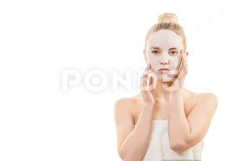 The clean face mask on the young woman on the white background Stock Photos