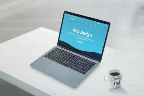 Clean, flat design promo web design studio web page on laptop concept. Close- Stock Photos
