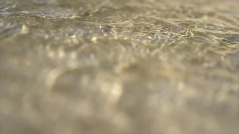 Clean fresh water ripples in the sand desert stream close up Stock Footage 219442595