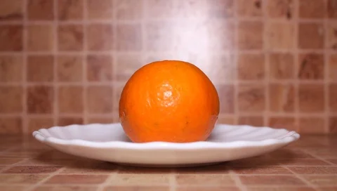 Clean the fruit with the hands from the peel, close-up palm fingers Stock Footage 102869014