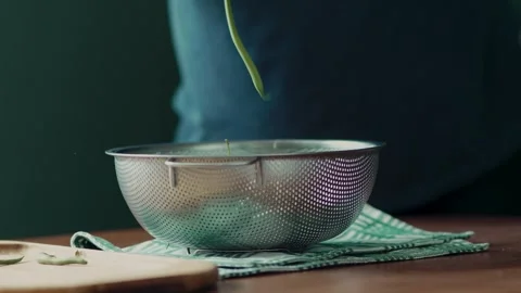 Clean green beans inside a stainless steel bowl on a kitchen counter Stock Footage 343555668