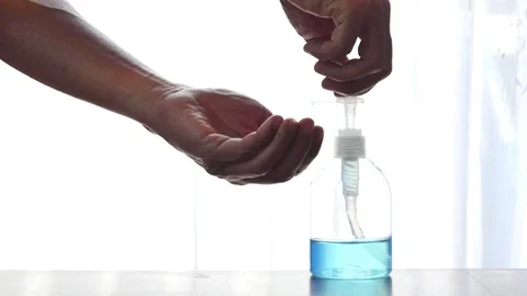 Clean hands with a cleaning gel  Vídeos de archivo 126595122
