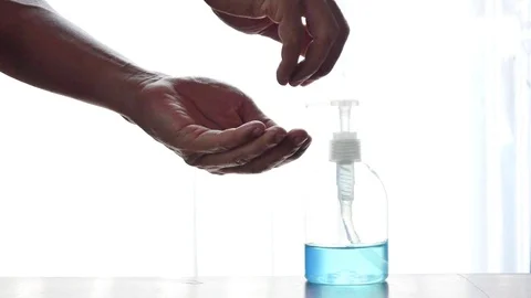 Clean hands with a cleaning gel  Vídeos de archivo 126595346