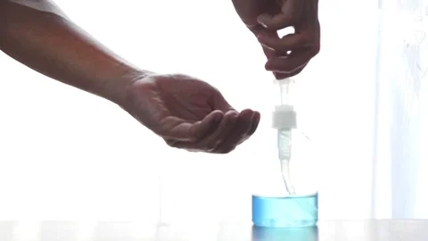 Clean hands with a cleaning gel  스톡 동영상 126595357