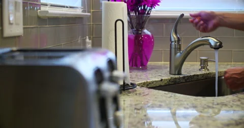 Clean Hands in Kitchen Sink Slow Motion Stock Footage 64817370