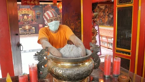 Clean The Incense Ashes In A Buddhist Temple Stock Footage 123451229