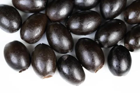 Clean layout showcasing black olives against bright background for branding.. Stock Photos
