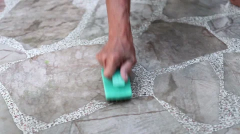 Clean up marble table with brush Stock Footage 36591177