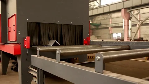 A clean metal structure exits the cleaning system and travels along a conveyor Video stock 76950971